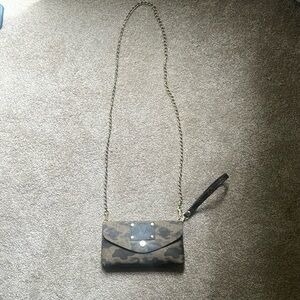 Unique clutch with repurposed LV embellishments